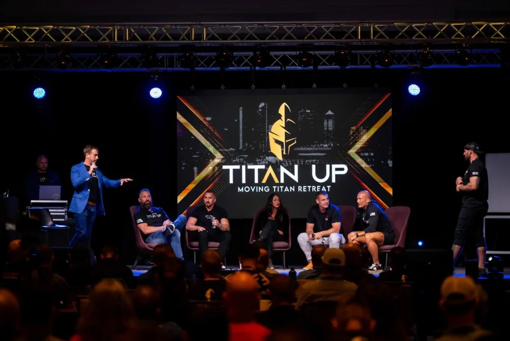 Panel discussion on stage at the Moving Titan retreat