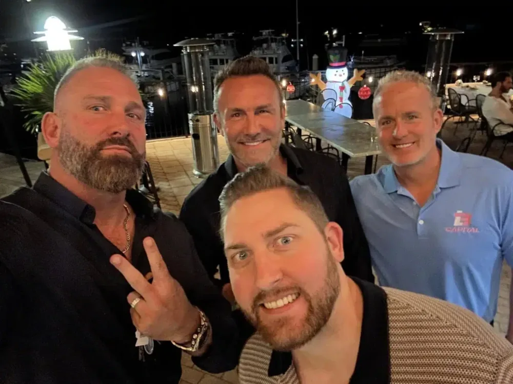 Regan Weiss with colleagues at a networking event